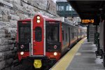 Outbound commuter approaches its station stop